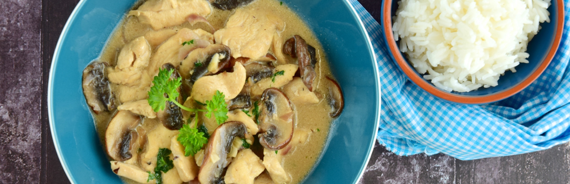 an image of creamy chicken with rice mushrooms in bowls
